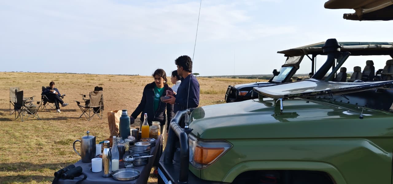 Open side Land Cruiser Maasai Mara game drive vehicle